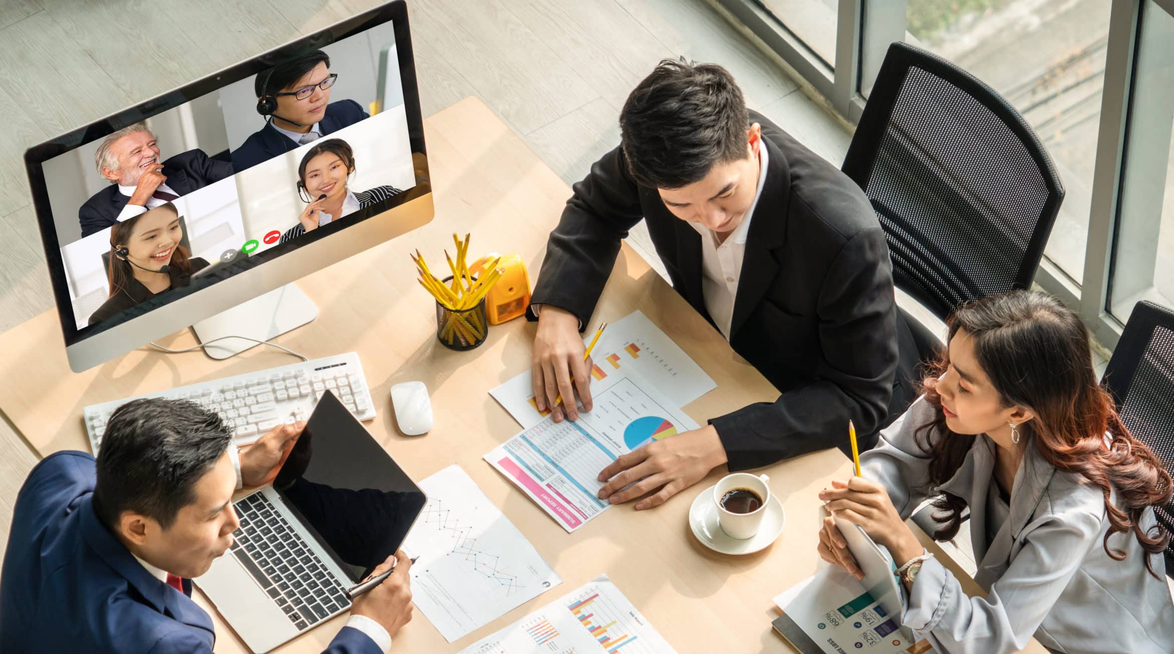 Video call group business people meeting on virtual workplace or remote office. Telework conference call using smart video technology to communicate colleague in professional corporate business.